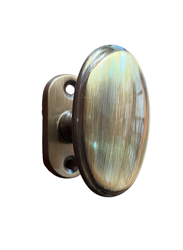 DOOR KNOB ON NARROW ROSE BRASS